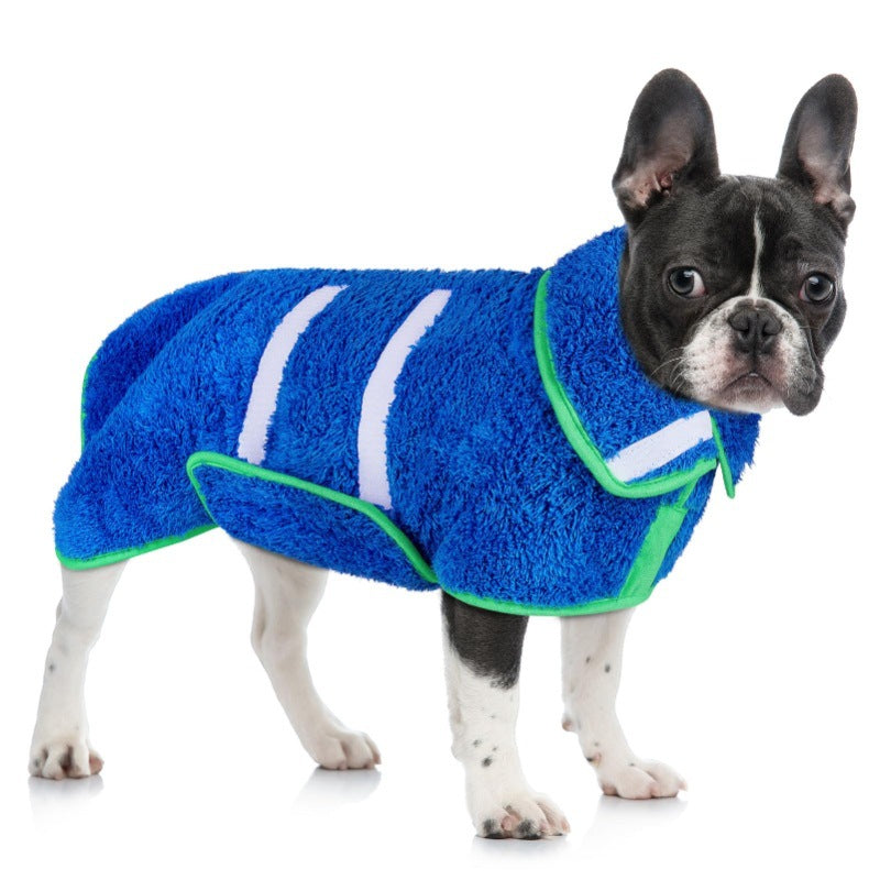 Blue shaggy pile dog bathrobe with green binding on a french bulldog, showing the back straps