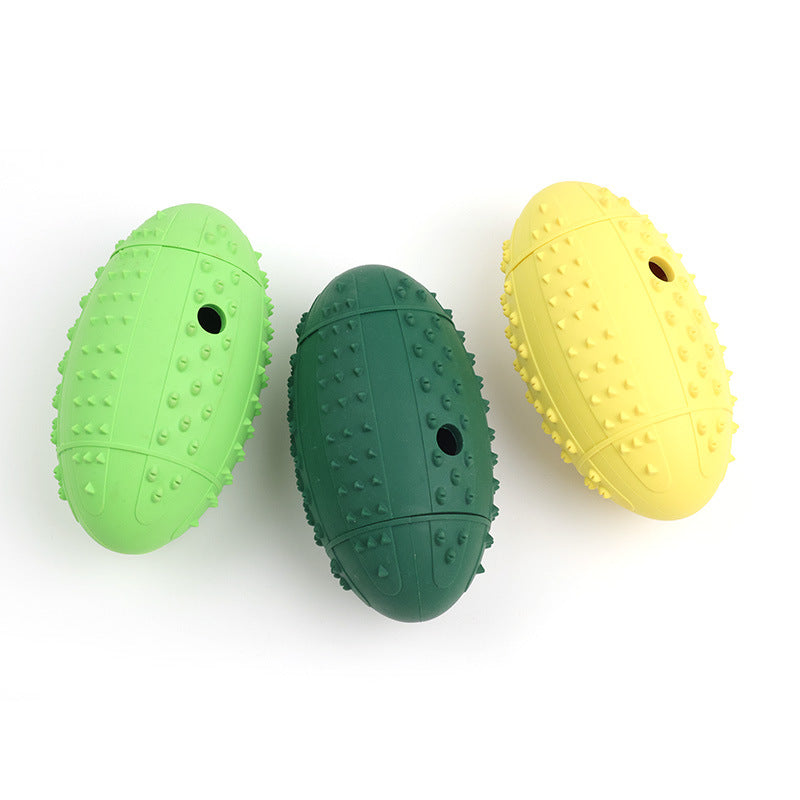 All three colourways of the rubber rugby ball dog toy together: lime green, forest green and yellow