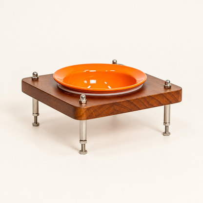 Low stand with orange bowl