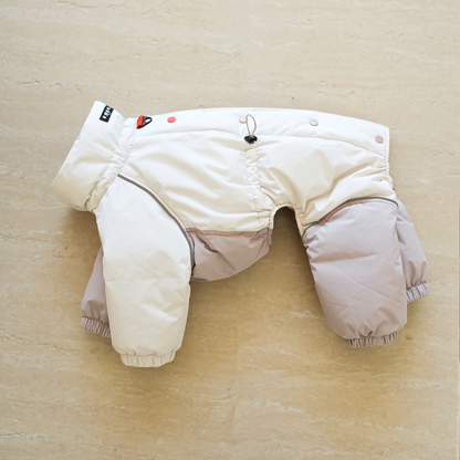 Ivory and pale grey-lilac Autumn Breeze four-leg suit laid flat, showing snap buttons, adjustment cord, piping and sewn collar label.