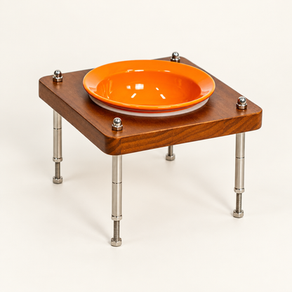 Tall stand with orange bowl