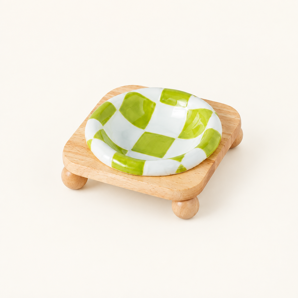 Green checkerboard bowl on low stand