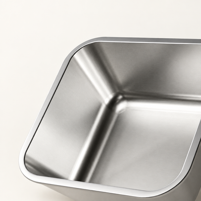 Close-up of a square stainless steel pet bowl