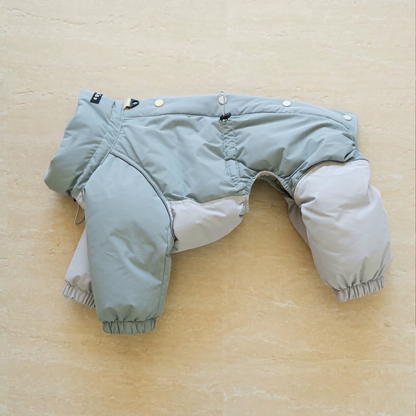 Sage and pale grey Autumn Breeze four-leg suit laid flat, showing snap buttons, adjustment cords, piping and elasticated cuffs.