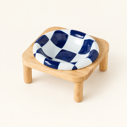 Blue checkerboard bowl on tall stand