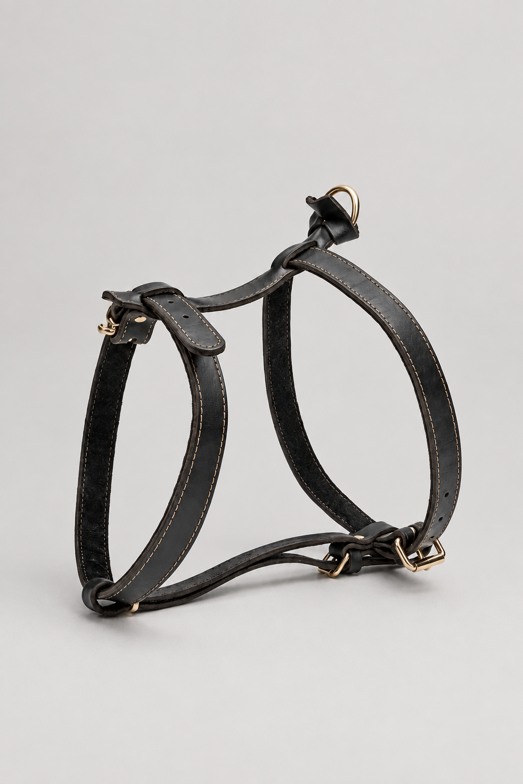 Upright black leather harness in our grey studio style